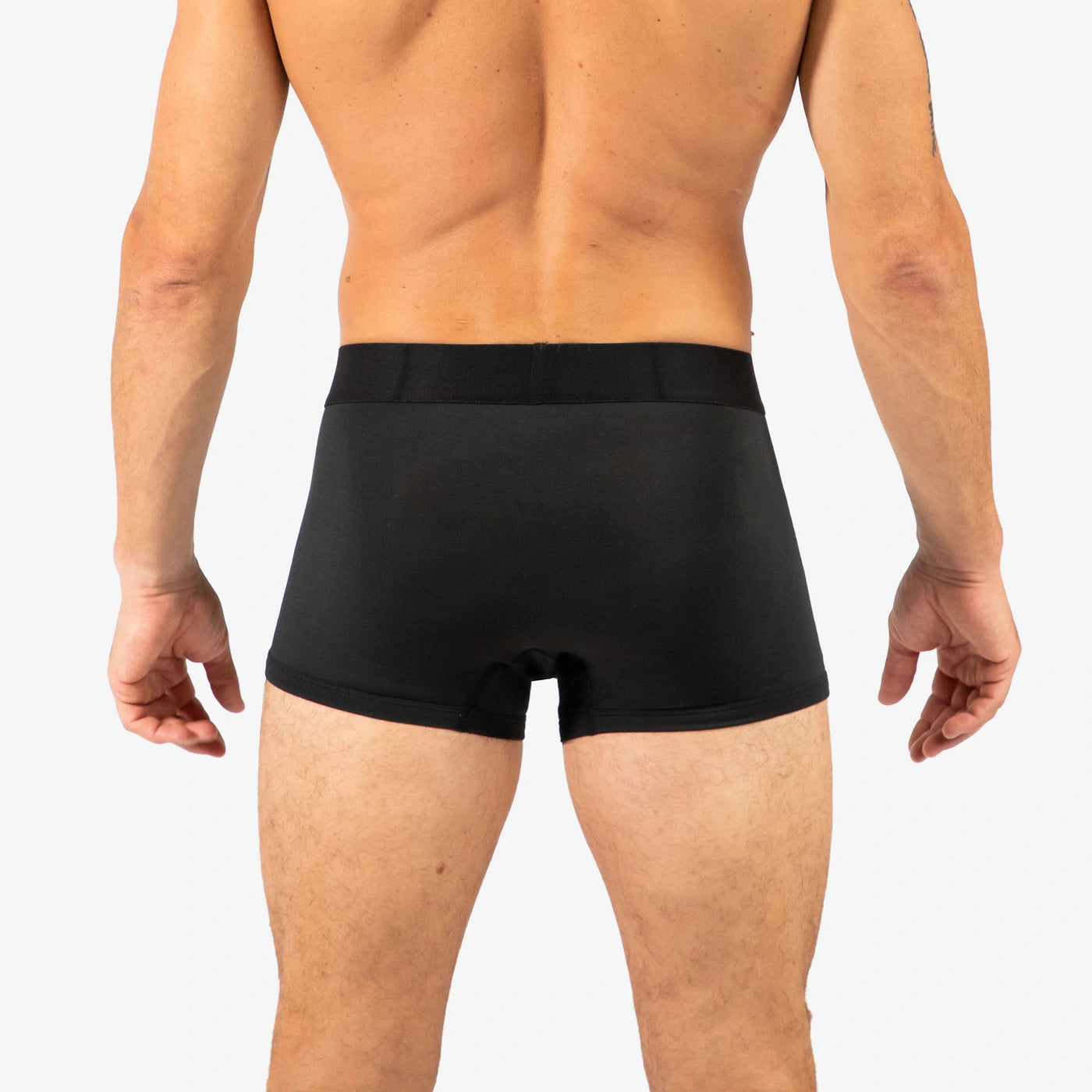 Man wearing Debriefs mens trunks underwear - black rear